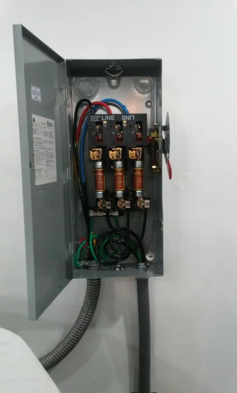 Three-phase disconnect switch installed for Smoke Detector Installation in Bel Air North